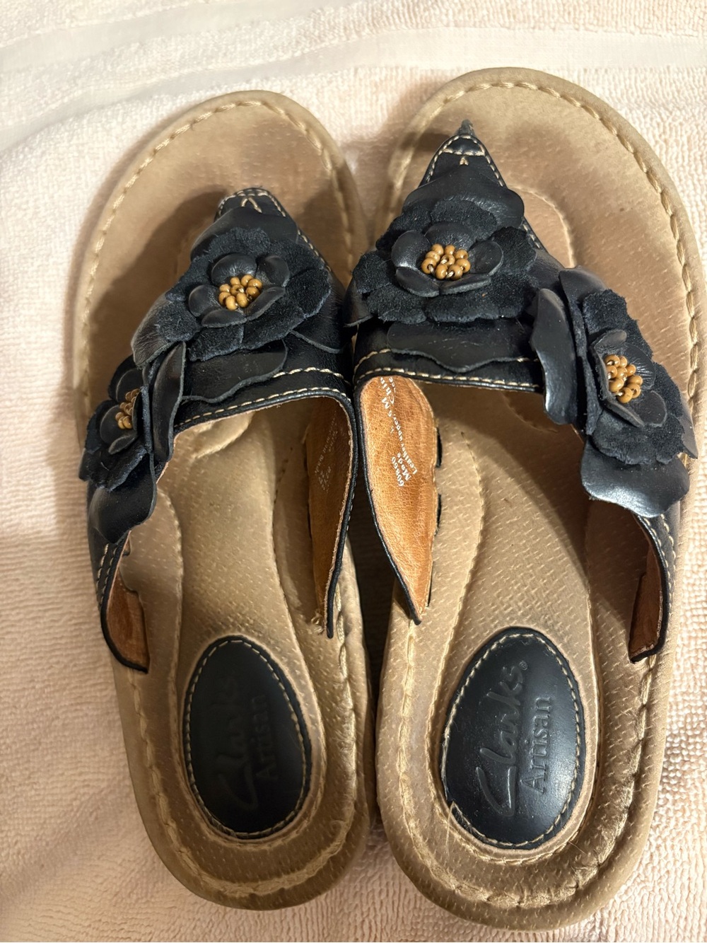 Clark’s artisan sandals with leather uppers